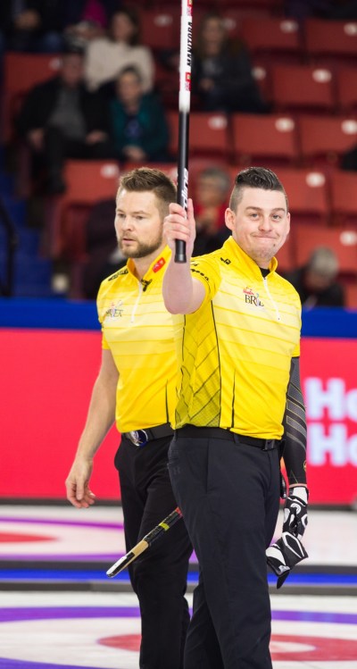 Chelsea Kemp/The Brandon Sun
Mike McEwen and Colin Hodgson of Team Manitoba salute the Westoba Place crowd at the Tim Hortons Brier Friday afternoon.