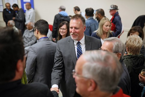 Progressive Conservative candidate Len Isleifson celebrates with supporters at the Discovery Centre after retaining Brandon East in Tuesday's election. (Tim Smith/The Brandon Sun)