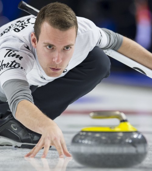 The Canadian Press
Team Wild Card skip Brendan Bottcher makes a shot during the Tim Hortons Brier at Westoba Place on Friday.