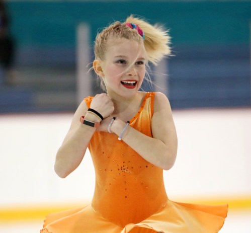 Marayna Kurchaba performs with a smile on her face to the song Walk Like An Egyptian during Skate Brandon's Rockin' the 80's year-end ice show at the Kinsmen Arena on Tuesday evening.  (Tim Smith/The Brandon Sun)