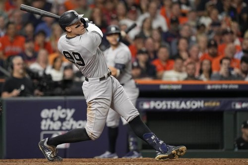 New York Yankees center fielder Aaron Judge (99) flys out during the eighth inning in Game 2 of baseball's American League Championship Series between the Houston Astros and the New York Yankees, Thursday, Oct. 20, 2022, in Houston. (AP Photo/Eric Gay)