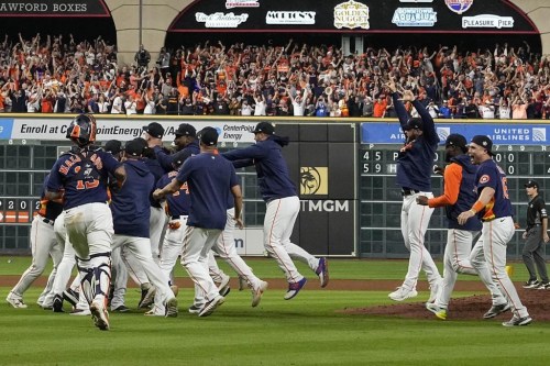 The Houston Astros celebrate their 4-1 World Series win against the Philadelphia Phillies in Game 6 on Saturday, Nov. 5, 2022, in Houston. (AP Photo/David J. Phillip)