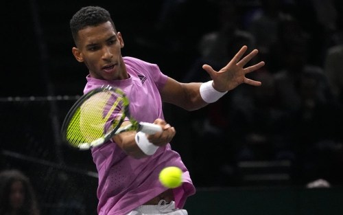 Felix Auger-Aliassime of Canada returns the ball to Holger Rune from Denmark during their semi final match of the Paris Masters tennis tournament at the Accor Arena in Paris, Saturday, Nov. 5, 2022. THE CANADIAN PRESS/AP, Michel Euler