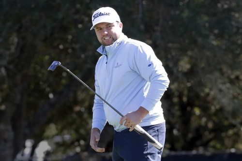 Ben Taylor reacts as his putt goes wide of the cup on the ninth green during the final round of the Houston Open golf tournament, Sunday, Nov. 13, 2022, in Houston. (AP Photo/Michael Wyke)