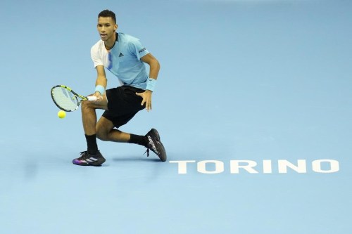 Canada's Felix Auger-Aliassime returns the ball to Norway's Casper Ruud during their singles tennis match of the ATP World Tour Finals, at the Pala Alpitour in Turin, Italy, Sunday, Nov. 13, 2022. THE CANADIAN PRESS/AP/Antonio Calanni