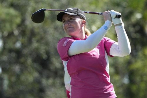 Gemma Dryburgh, of Scotland, watches her shot from the third tee during the third round of the LPGA CME Group Tour Championship golf tournament, Saturday, Nov. 19, 2022, at the Tiburón Golf Club in Naples, Fla. (AP Photo/Lynne Sladky)