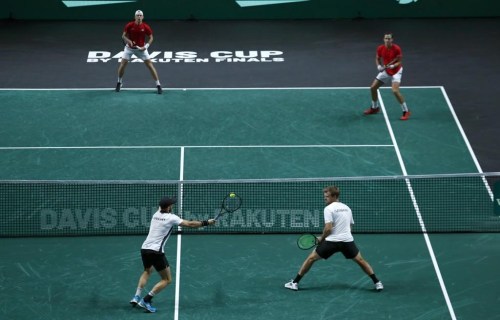 Kevin Krawietz and Tim Puetz of Germany play against Canada's Vasek Posposil and Denis Shapovalov during a Davis Cup quarter-final tennis match between Germany and Canada in Malaga, Spain, Thursday, Nov. 24, 2022. (AP Photo/Joan Monfort)