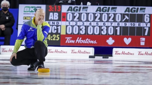 Team Alberta skip Kevin Koe reacts to a missed shot during finals action against Team Wild Card One at the Tim Hortons Brier in Lethbridge, Alta., Sunday, March 13, 2022. THE CANADIAN PRESS/Jeff McIntosh