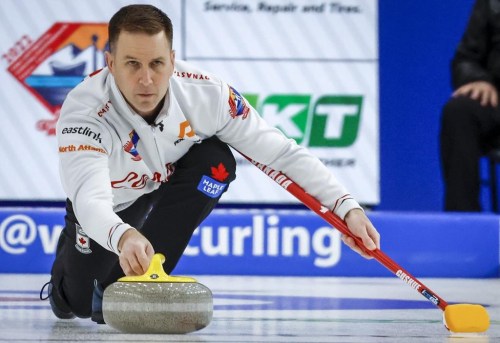 Canada skip Brad Gushue makes a shot during the men's gold medal game against Korea at the Pan Continental Curling Championships in Calgary, Alta., Sunday, Nov. 6, 2022. Gushue and Matt Dunstone dropped their opening games Tuesday at the Grand Slam of Curling's Masters event. THE CANADIAN PRESS/Jeff McIntosh