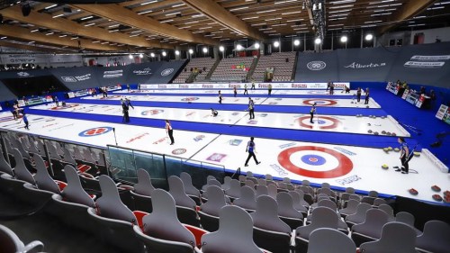 Play gets underway as cardboard cutouts of fans look on at the Scotties Tournament of Hearts in Calgary, Alta., Friday, Feb. 19, 2021.Calgary has been named the host city for the 2024 Scotties Tournament Hearts national women’s curling championship.THE CANADIAN PRESS/Jeff McIntosh