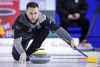 Team Wild Card One skip Brad Gushue makes a shot while playing Team Saskatchewan during semi-final action at the Tim Hortons Brier in Lethbridge, Alta., Saturday, March 12, 2022. Brad Gushue and Matt Dunstone are set to clash for a spot in the quarterfinals of the Grand Slam of Curling's Masters on Saturday. THE CANADIAN PRESS/Jeff McIntosh