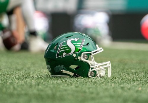 A football helmet sits on the field before CFL football action with the Hamilton Tiger-Cats playing the Saskatchewan Roughriders in Regina on Saturday, June 11, 2022. Kelly Jeffrey was named the new offensive coordinator of the Saskatchewan Roughriders on Monday. THE CANADIAN PRESS/Heywood Yu