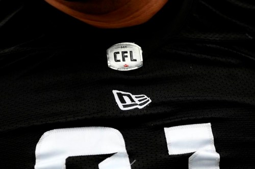 The CFL logo is seen on a jersey during the Redblacks training camp in Ottawa on Thursday, May 19, 2022. THE CANADIAN PRESS/Justin Tang