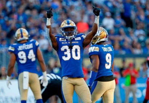 Winnipeg Blue Bombers' Winston Rose (30) gets the crowd going during the first half of CFL action against the Calgary Stampeders, in Winnipeg, Friday, July 15, 2022. The Blue Bombers have signed cornerback Rose to a one-year contract extension.THE CANADIAN PRESS/John Woods