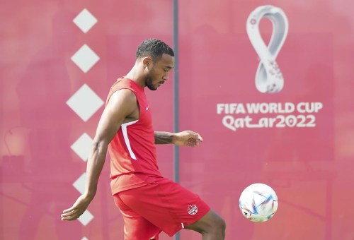 Canada defender Derek Cornelius kicks the ball during practice ahead of the World Cup in Doha, Qatar on Saturday, November 19, 2022. Defender Cornelius was transferred by the Vancouver Whitecaps to Sweden's Malmo FF on Thursday.THE CANADIAN PRESS/Nathan Denette