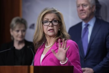 Sen. Marsha Blackburn, R-Tenn., and other Republican senators tell reporters they want the COVID-19 vaccine mandate for members of the U.S. military to be rescinded under the annual defense bill, at the Capitol in Washington, Thursday, Dec. 15, 2022. (AP Photo/J. Scott Applewhite)