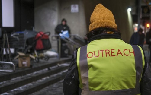 Outreach volunteers offer help to the homeless on a -20 C night in Calgary, Alta., Tuesday, Dec. 14, 2021. Social agencies and advocates say rising interest rates and a high rate of inflation are pushing more Canadians into homelessness. THE CANADIAN PRESS/Jeff McIntosh