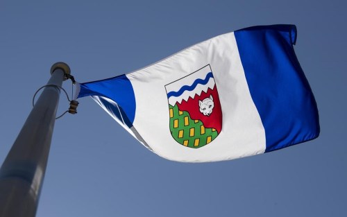 The Northwest Territories flag flies on a flag pole in Ottawa, Monday July 6, 2020. A privacy breach affecting people who stayed at a COVID-19 isolation centre is the latest in a long line of cases of health information being mishandled in the Northwest Territories. THE CANADIAN PRESS/Adrian Wyld