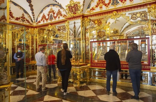 FILE - Visitors stand in the Jewel Room during the reopening of the Green Vault Museum in Dresden's Royal Palace of the Dresden State Art Collections (SKD) in Dresden, Germany, May 30, 2020. German authorities said Saturday Dec. 17, 2022, that they have recovered a significant part of the 18th-century treasures stolen from Dresden's Green Vault museum in a spectacular break-in more than three years ago. (AP Photo/Jens Meyer, file)