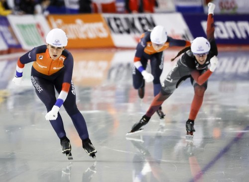 vanie Blondin of Canada, right, and Irene Schouten, of the Netherlands, cross the finish line during the women's mass start competition at the ISU World Cup speed skating event in Calgary, Alta., Sunday, Dec. 18, 2022.THE CANADIAN PRESS/Jeff McIntosh