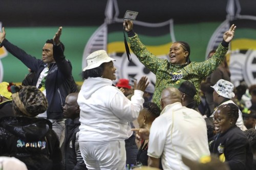 African National Congress (ANC) delegates celebrate during the voting process at the 55th National Conference Sunday, Dec. 18, 2022. (AP Photo)