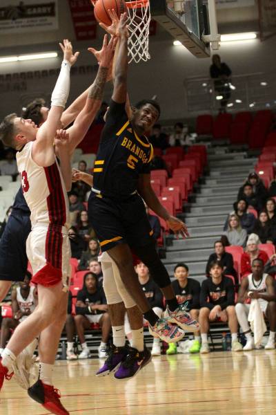 Khari Ojeda-Harvey jumps for a rebound as the Brandon Bobcats lose to the Winnipeg Wesmen on Thursday. (Thomas Friesen/The Brandon Sun)