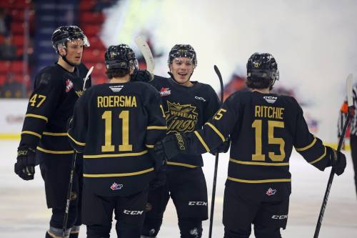 Brandon Wheat Kings player Mason Ward (47), Rylen Roersma (11), Matt Henry (61) and Nolan Ritchie (15) celebrate Roersma's goal during the second period of WHL action against the Prince Albert Raiders at Westoba Place on Friday evening. 
(Photos by Tim Smith/The Brandon Sun)
