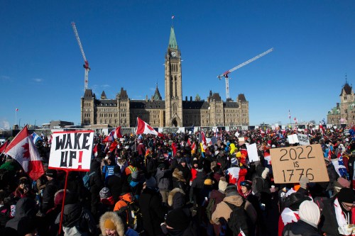 Supporters arrive at Parliament Hill in Ottawa for the so-called Freedom Convoy to protest against COVID-19 vaccine mandates and restrictions on Jan. 29. (Getty Images, File)