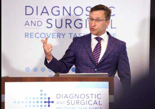 Dr. Ed Buchel, surgical lead on the wait time task force steering committee, speaks to media in April. (Ruth Bonneville/Winnipeg Free Press)