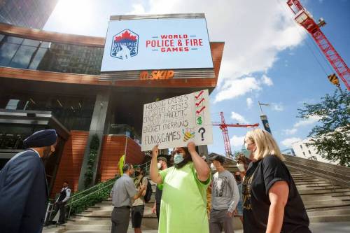 Protesters at the announcement that Winnipeg was chosen as the location for the 2023 World Police and Fire Games in 2022. (Winnipeg Free Press)