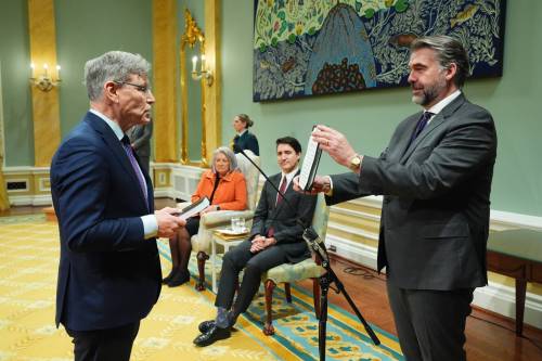 Minister of Sport Terry Duguid is sworn in by Clerk of the Privy Council John Hannaford during a cabinet swearing-in ceremony at Rideau Hall in Ottawa on Friday as Prime Minister Justin Trudeau and Gov. Gen. Mary Simon look on. More cabinet shuffle coverage on Page A6. (The Canadian Press)