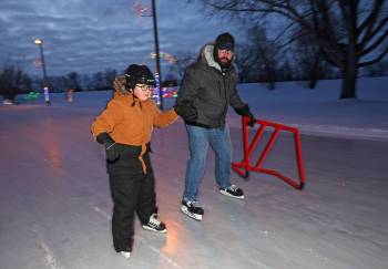 Sylas Kissock and his dad Jason skate together at the Brandon Skating Oval last winter. The skating oval and the display of lights are now open for the season. (File photos)
                                Sylas Kissock and his dad Jason skate together at the Brandon Skating Oval last winter. The skating oval and the display of lights are now open for the season. (File photos)