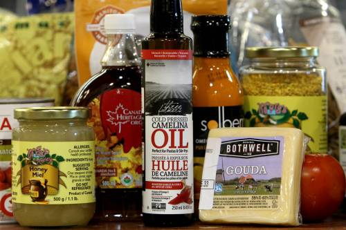 A selection of Canadian sourced foods are seen on display as Marnie Scott promoted her website Canadian Cool Foods in 2017. (File photo)