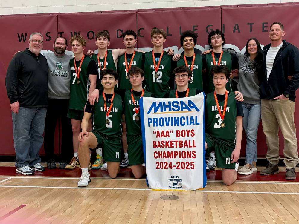 Don Thomson, left, coached under former Spartan Adam Philpott this year, claiming his ninth basketball provincial title. (Submitted)