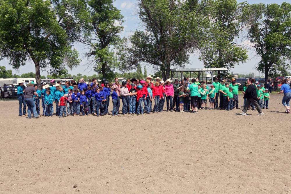 A group of 4-H members from around the southwest gathered in Boissevain this month for the Boissevain 4-H Zone Rally. A total of 76 kids turned up for the event. The activities included horse riding shows, practise showing cattle for show and sales and a parade through town. The club members gathered at the Boissevain Ag Grounds for a photo in between competitions. In the audience, several people told the Sun they are grandparents of kids in clubs. A cattle producer in his 70s said he had once been a member of 4-H as well, and now comes to show support for his grandkids.