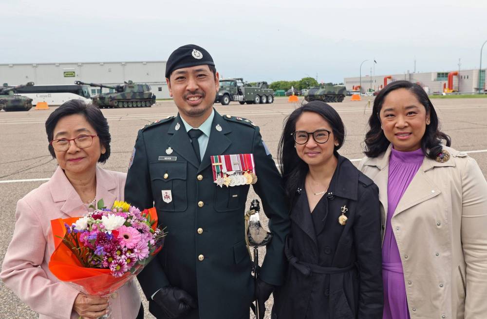 New base commander at CFB Shilo, Lieutenant-Colonel Jack Nguyen, stands with his mother Diem Hong (left), and sisters Robin Arevalo and Helen Hoon after the recent change-of-command ceremony. Nguyen said his priority would be building connections between the base and the surrounding community. (Photos by Connor McDowell/Brandon Sun)