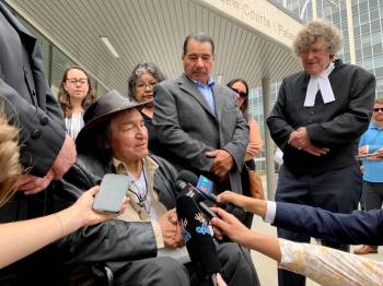Allan Woodhouse (front, from left), Brian Anderson and James Lockyer, the director of Innocence Canada. The city&rsquo;s interim director of legal services is recommending council&rsquo;s executive policy committee approve a contribution to a wrongful conviction settlement for Woodhouse, Anderson and a third man. (Brittany Hobson/The Canadian Press files)