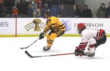 Brandon Wheat Kings forward Hunter Ethelston (92) goes hard to the net around Southwest Cougars defenceman Jake Beaty (3) during Manitoba U18 AAA Hockey League action at J&G Homes Arena on Saturday evening. (Photos by Perry Bergson/The Brandon Sun)