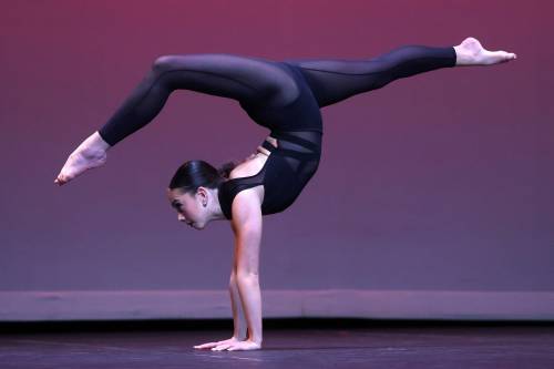 Abigail Hawkins performs in the acro dance, solo, own choice, 18 years and under category during Day 3 of the dance portion of the Brandon Festival of the Arts at the Western Manitoba Centennial Auditorium on Tuesday. See more photos on Page A3. (Tim Smith/The Brandon Sun)