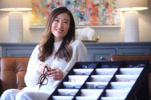 Kathy Tran-Riese, owner of KayTran Eyewear, is working hard to repair her business&rsquo;s relationship with its American customers. (Ruth Bonneville/Winnipeg Free Press)