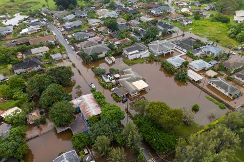 Streets are flooded from severe rains on Friday in Haleiwa, Hawaii. (The Associated Press)