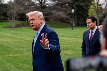 President Donald Trump waves, with Secretary of State Marco Rubio, before departing on Marine One from the South Lawn of the White House on Friday in Washington. Experts say Canada&rsquo;s need to engage with the U.S. will remain, regardless of NATO&rsquo;s future, which Trump has called into question. (The Associated Press)