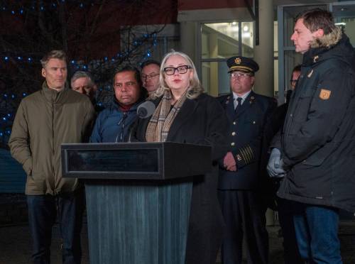 B.C. Minister of Public Safety Nina Krieger speaks alongside B.C. Premier David Eby, federal Minister of Housing and Infrastructure Gregor Robertson and federal Minister of Public Safety Gary Anandasangaree during a press conference in Tumbler Ridge, B.C. on Feb. 11. (The Canadian Press files)