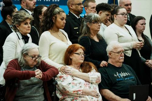 Family members of the victims react as they listen Suffolk County District Attorney Raymond A. Tierney during a news conference after Rex Heuermann, accused in Long Island&rsquo;s infamous Gilgo Beach serial killings, pleaded guilty on Wednesday at Suffolk County Police Academy Gymnasium in Brentwood, N.Y. (The Associated Press)