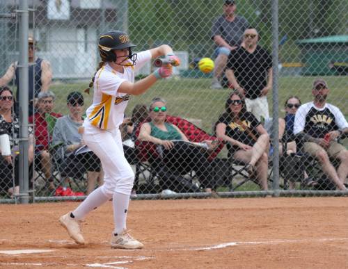 Westman Heat batter Haleigh Cuvelier lays down a bunt against the Westman Storm during U15 softball action at Ashley Neufeld Softball Complex on Friday evening. (Thomas Friesen/The Brandon Sun)