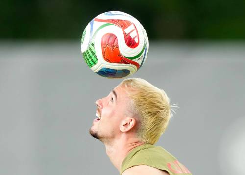Liam Millar heads the ball during Team Canada World Cup roster selection camp in Charlotte, N.C., on May 26. For the next five weeks, soccer &mdash; or football, as Bruce Penton points out it is known across most of the world &mdash; will dominate sports news. (The Canadian Press files)