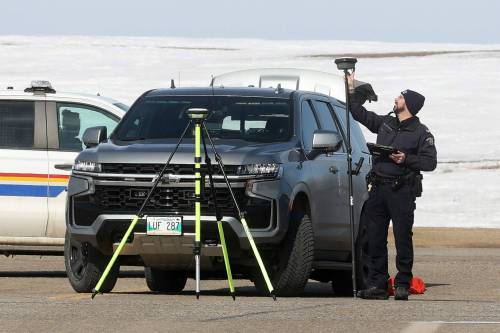 RCMP investigate a fatal crash on the Trans-Canada Highway west of Brandon earlier this year. The RCMP has had some success boosting their ranks in Manitoba. (Tim Smith/The Brandon Sun files)