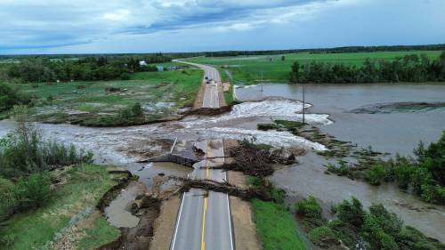 More than 50 provincial roads &mdash; including this section of Highway 10, north of Pine River &mdash; along with numerous municipal roads, remain damaged, flooded or washed out. (Government of Manitoba)