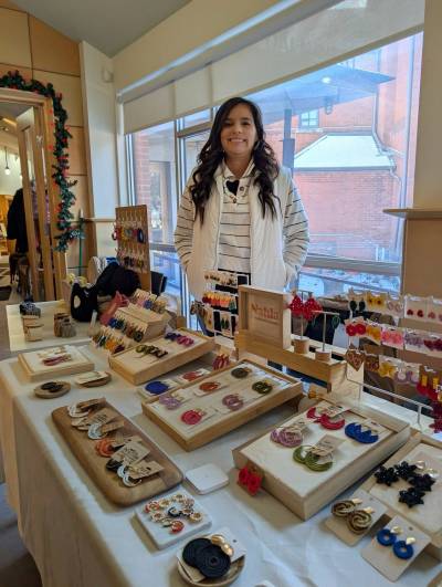 Sabrina Gomez, founder of Nahla Handmade, displays her handmade jewellery at a market. (Photo submitted)