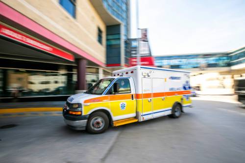 Ambulances pull in and out of the Health Sciences Centre in May. (Mikaela MacKenzie/Winnipeg Free Press files)